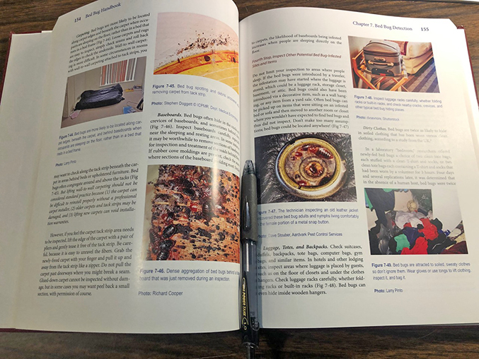 Handbook open on desk
